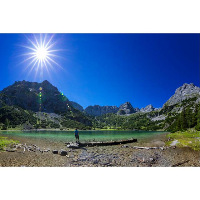 Hiker At Alpin Lake At Sunny Day - Seebensee Tirol by DieterMeyrl - No Frame Art Prints on Canvas Alpen Home Size: 81cm H x 122cm W on Productcaster.