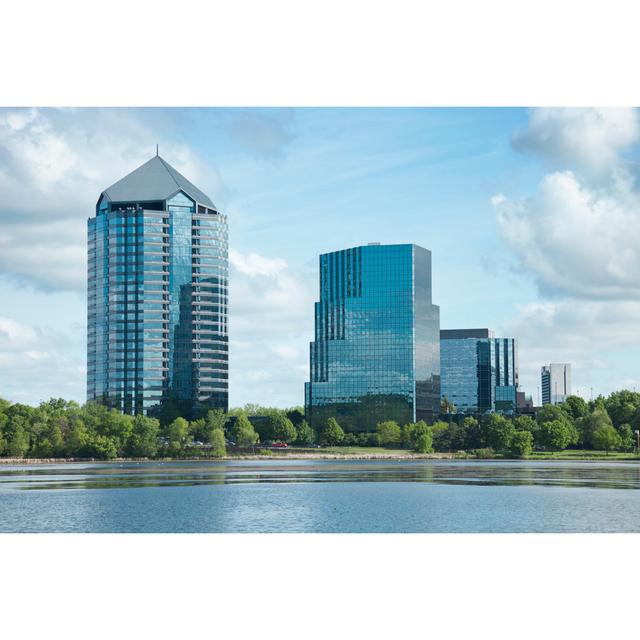 Buildings with Lake - Wrapped Canvas Photograph 17 Stories Size: 61cm H x 91cm W on Productcaster.