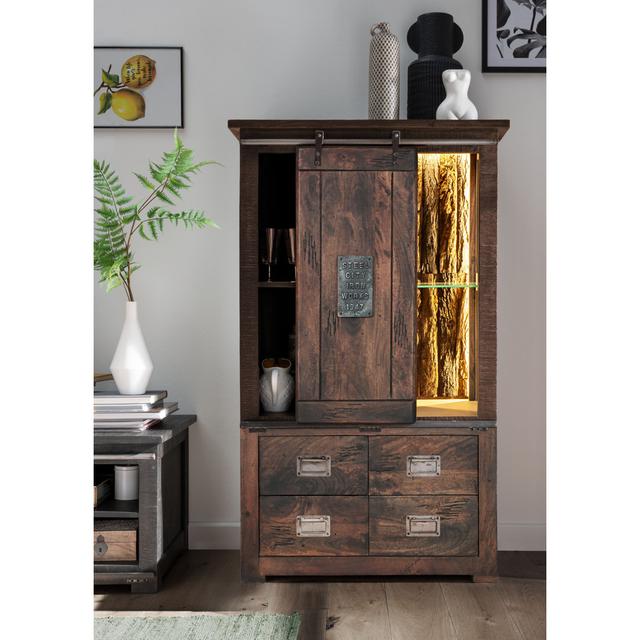 Highboard Mango massiv braun lackiert 90x150x45 cm inkl. Beleuchtung und Schiebetür Sommerallee on Productcaster.