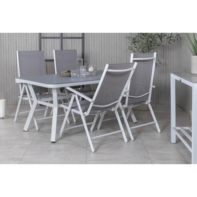 Bodomar Dining Set with 4 Chairs 17 Stories Colour (Table Base): White, Colour (Chair): Grey on Productcaster.