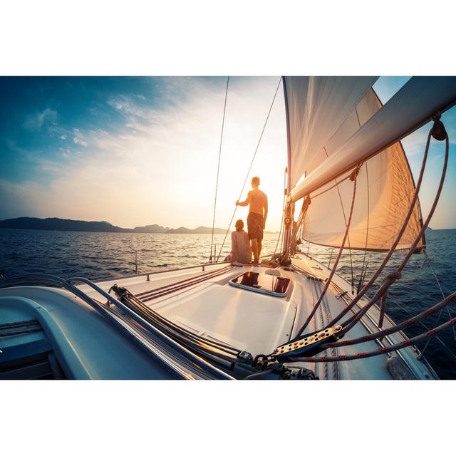 Couple Enjoying Sunset from The Sail Boat by Mihtiander - Wrapped Canvas Photograph Longshore Tides Size: 51cm H x 76cm W x 3.8cm D on Productcaster.