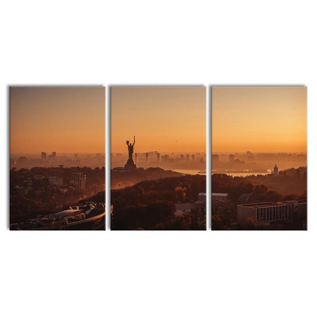 Sunset in Kyiv - Wrapped Canvas Photograph Latitude Run Format: 3 piece Canvas set, Size: 70cm H x 210cm W x 2cm D on Productcaster.