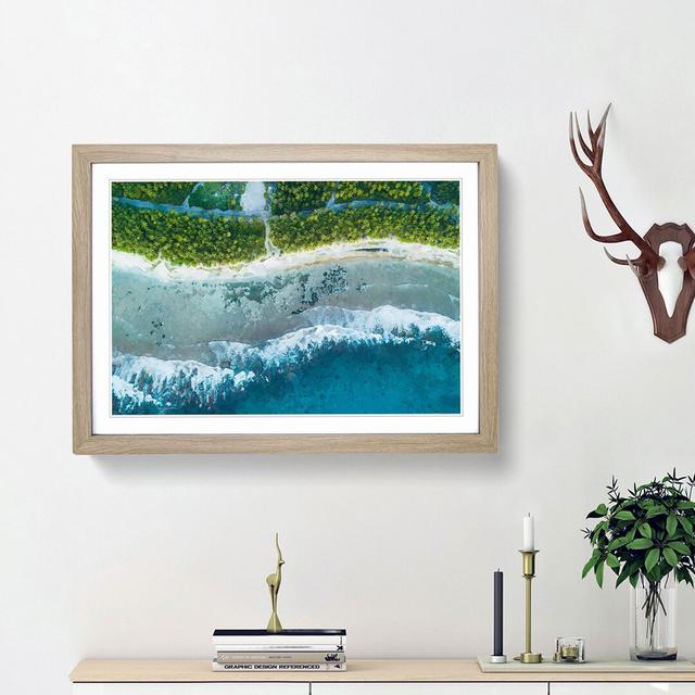 Over the Maldives - Picture Frame Graphic Art Print East Urban Home Size: 62cm H x 87cm W x 2cm D, Frame Option: Oak Framed on Productcaster.