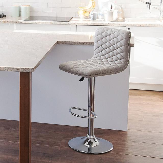 Laurel Height Adjustable Swivel Bar Stool (Set of 2) Metro Lane Upholstery Colour: Beige on Productcaster.