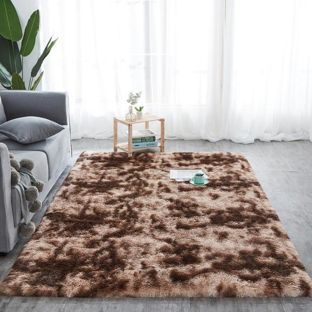 Chakyra Solid Colour Machine Woven Brown Area Rug 17 Stories Rug Size: Rectangle 160 x 230cm on Productcaster.