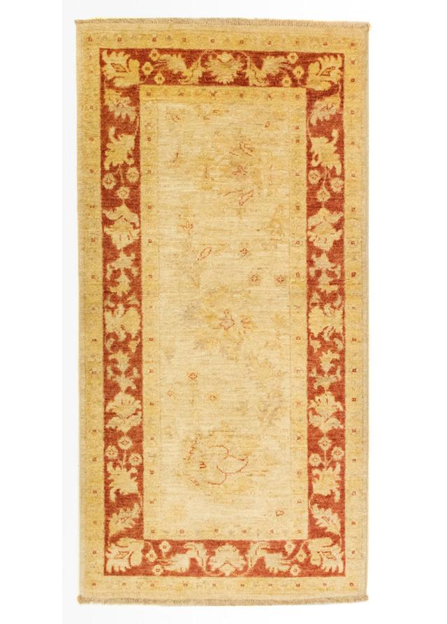 Handgefertigter Teppich Amely aus Wolle in Rot/Beige Rosalind Wheeler on Productcaster.