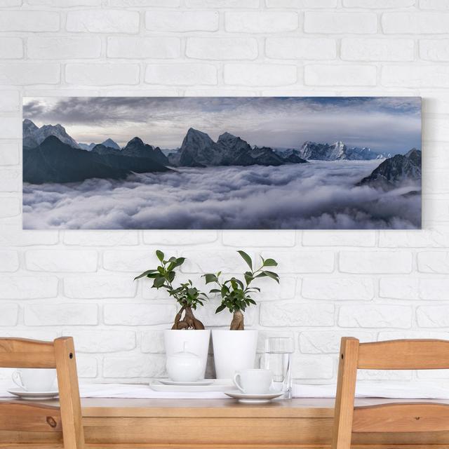 Leinwandbild Sea of Clouds in the Himalayas Union Rustic on Productcaster.