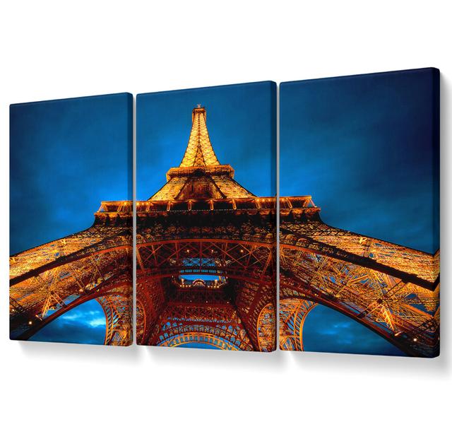 Paris at Night Eiffel Tower View from Below - 3 Piece Wrapped Canvas Graphic Art Ebern Designs Size: 81.3cm H x 163cm W on Productcaster.