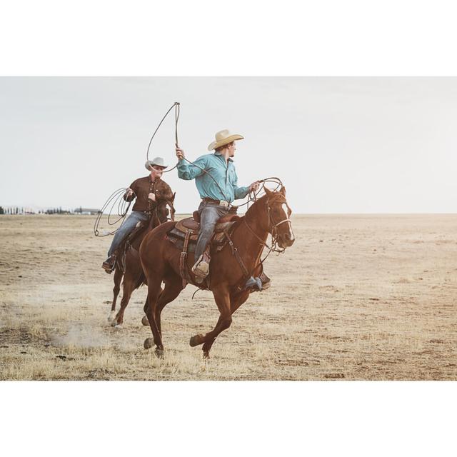 Cowboys Galloping With Their Horses by Mlenny - No Frame Art Prints on Canvas Natur Pur Size: 61cm H x 91cm W on Productcaster.