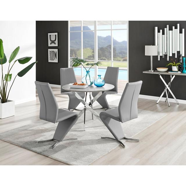 Tierra Modern Chrome Metal & Glass Round Dining Table Set with 4 Modern Design Faux Leather Chairs Canora Grey Chair Colour: Grey, Table Size: 75cm H on Productcaster.