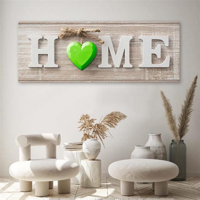 Leinwandbild Home inscription with a green heart on a light wood Sommerallee Größe: 40 cm H x 120 cm B x 2 cm T on Productcaster.