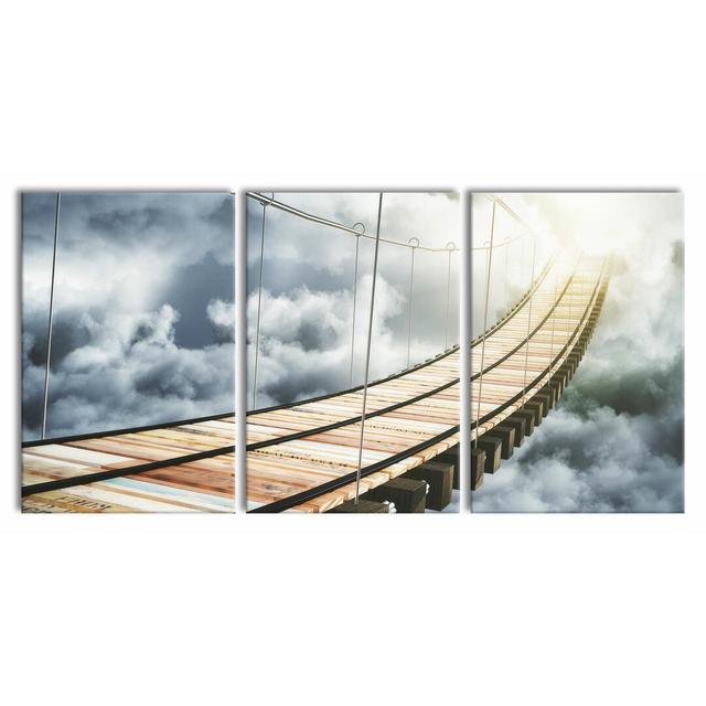 Wooden Bridge In The Clouds - 3 Piece Wrapped Canvas Print East Urban Home Size: 120cm H x 240cm W on Productcaster.