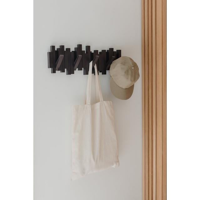 Wandgarderobe Sticks Umbra Farbe: Espressobraun on Productcaster.