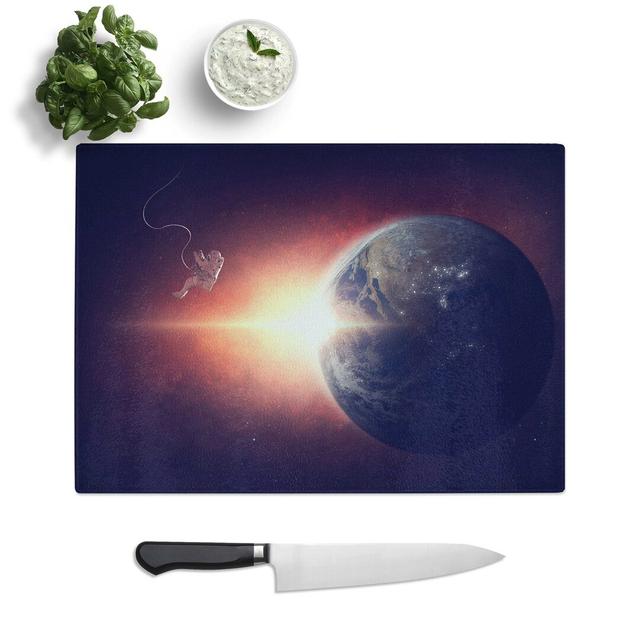 Tempered Glass Astronaut and Planet Earth Chopping Board East Urban Home Size: 39 cm W x 28.5 cm L on Productcaster.