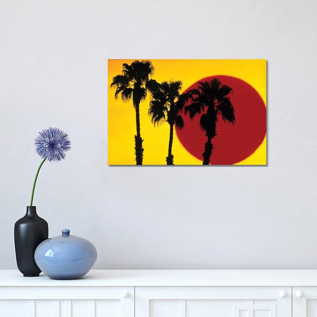 1990s 3 Silhouetted Palm Trees Against Yellow Sky With Big Red Sun - Wrapped Canvas Painting 17 Stories Size: 30.48cm H x 45.72cm W x 1.91cm D on Productcaster.