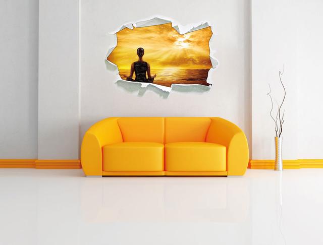 Wandtattoo Frau meditiert bei Sonnenaufgang am Strand East Urban Home Größe: 45 cm H x 62 cm B x 0,02 cm T on Productcaster.