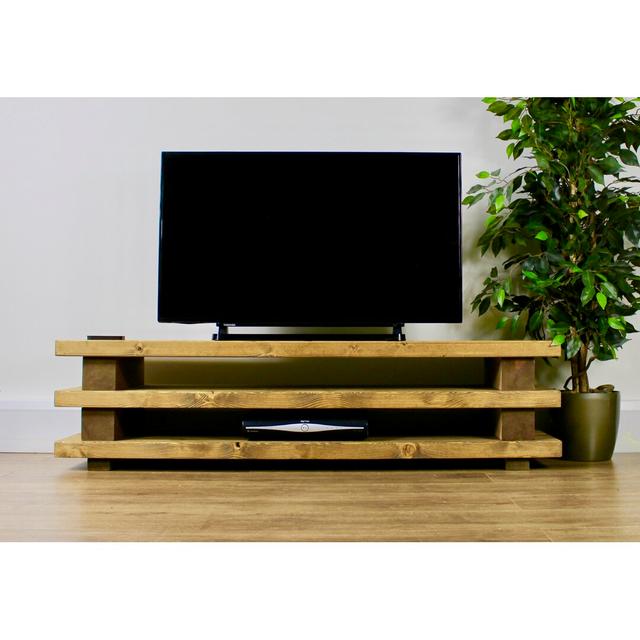 Alaca TV Stand for TVs up to 58" Union Rustic Colour: Medium Brown, TV Stand Width - Side to Side (cm): 130" on Productcaster.