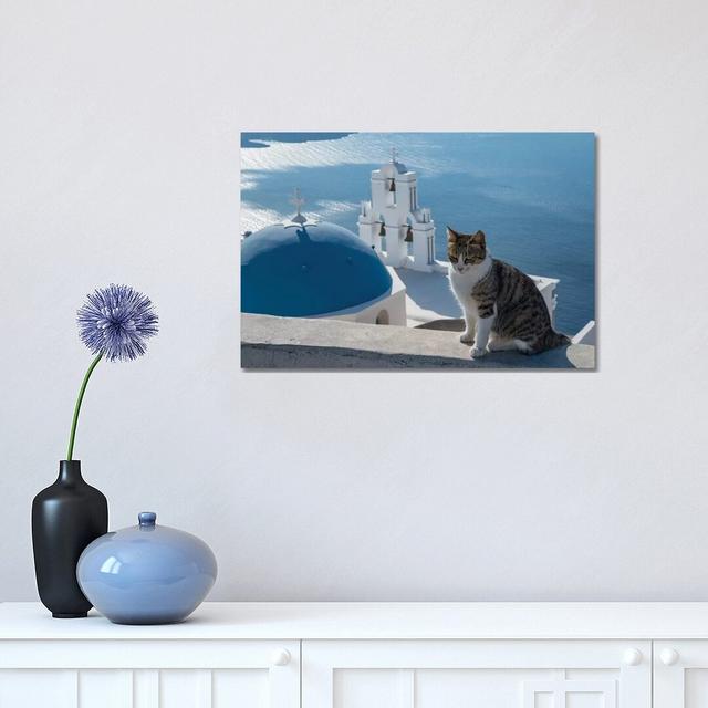 Greece, Santorini. Cat Posing On The Wall Above The Iconic Three Bells Of Fira Highland Dunes Size: 30.48cm H x 45.72cm W x 1.91cm D on Productcaster.