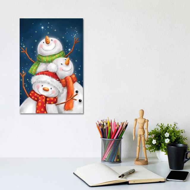 Three Snowmen Blue Background by MAKIKO - Wrapped Canvas Print The Seasonal Aisle Size: 30.5cm H x 20.3cm W x 1.91cm D on Productcaster.