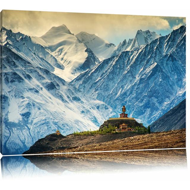 Leinwandbild ,,Einsamer Tempel an verschneiten Bergen in Tibet", Grafikdruck Pixxprint Größe: 70 cm H x 100 cm B on Productcaster.