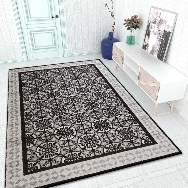 Lynelle Oriental Machine Woven Grey/Black Area Rug Latitude Run Rug Size: Rectangle 120 x 170cm on Productcaster.