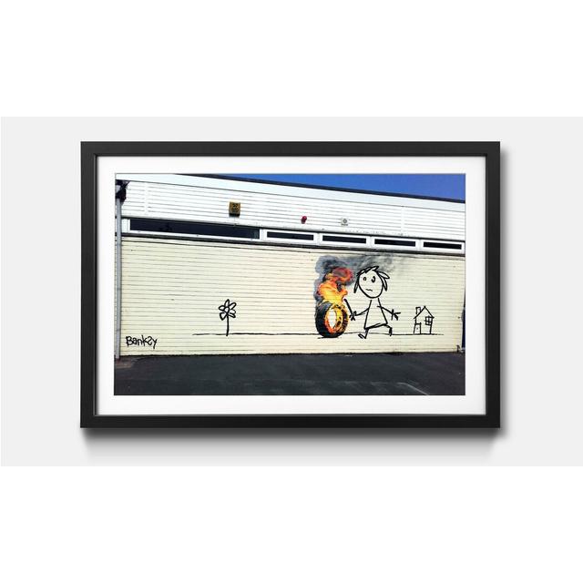 Gerahmtes Poster Play with Fire von Banksy Ebern Designs Maße: 32 cm H x 42 cm B x 2,2 cm T on Productcaster.