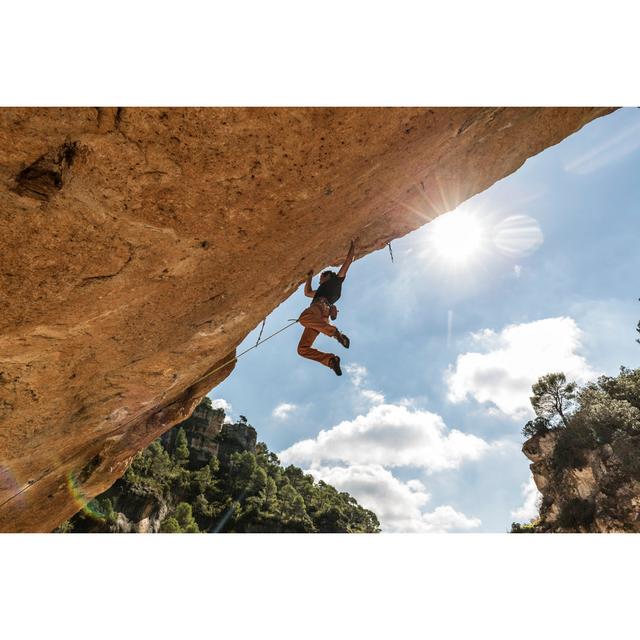 Man Practicing Rock Climbing by Aluxum - No Frame Art Prints on Canvas 17 Stories Size: 30cm H x 46cm W on Productcaster.