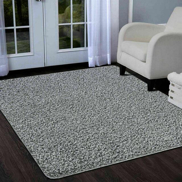 Bercher Solid Colour Machine Woven Area Rug 17 Stories Rug Size: Rectangle 60 x 110cm on Productcaster.