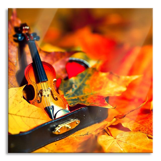 Violin Surrounded by Leaves - Unframed Photograph on Glass Brayden Studio Size: 60cm H x 60cm W x 0.4cm D on Productcaster.