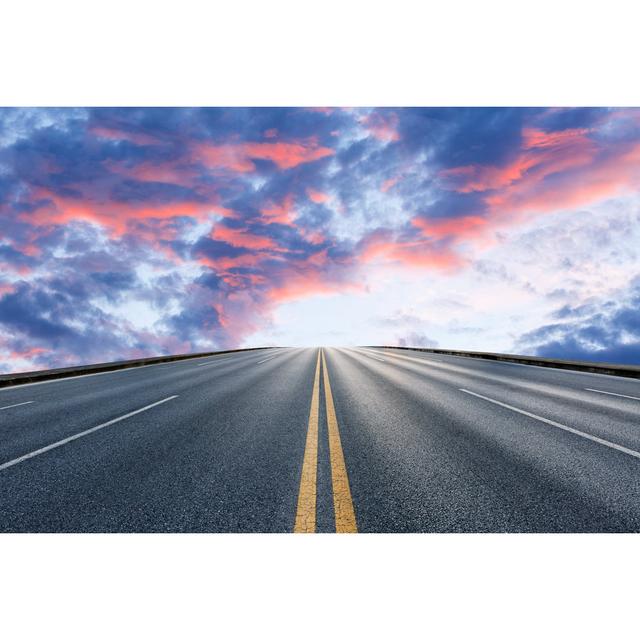 Highway At Sunset by Zhaojiankang - Wrapped Canvas Print Ebern Designs Size: 61cm H x 91cm W x 3.8cm D on Productcaster.