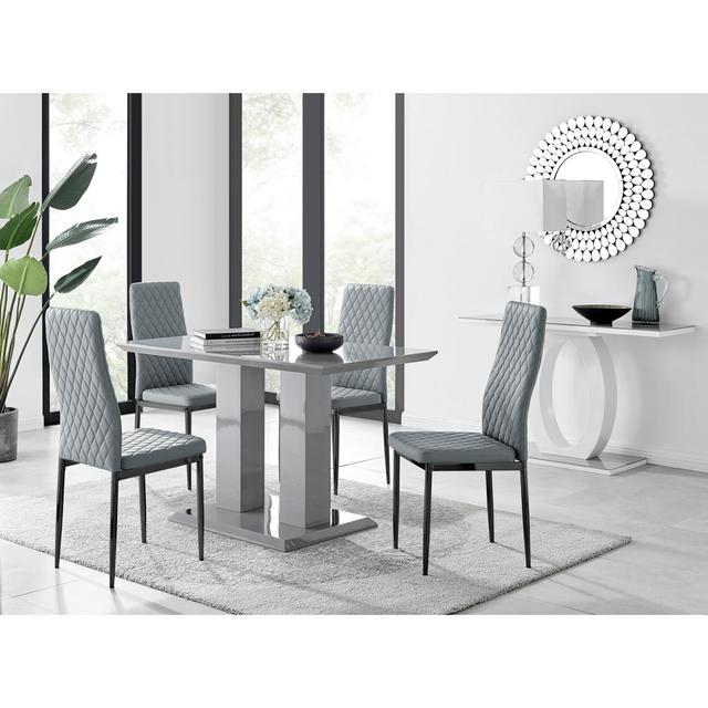 Eubanks 4 - Person Dining Set Canora Grey Chair Colour: Black/Gold, Table Colour: Grey on Productcaster.