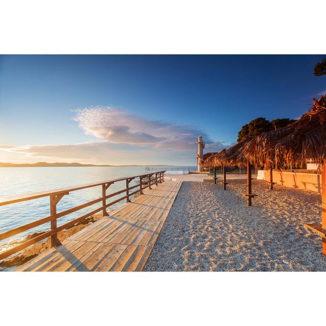 Wooden Walkway Leading To A Lighthouse In Zadar, Croatia Longshore Tides Size: 81cm H x 122cm W x 3.8cm D on Productcaster.