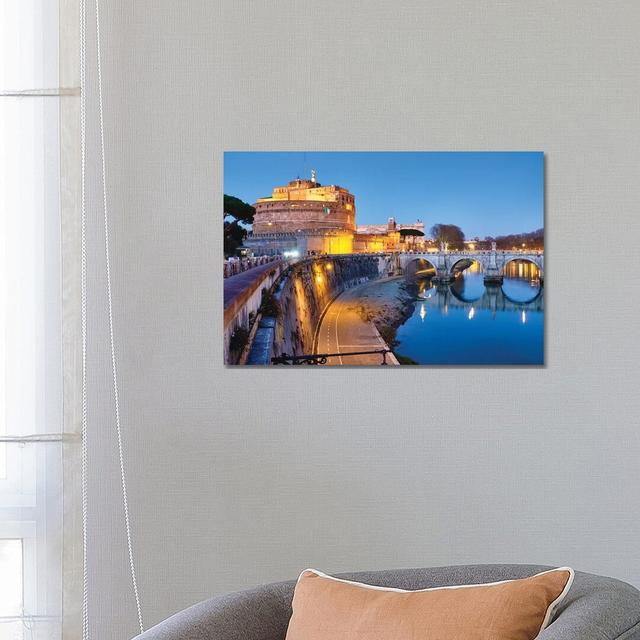 Castle of the Holy Angel Lit up at Dusk, Rome, Lazio, Italy by George Oze - Wrapped Canvas Photograph Latitude Run Size: 45.72cm H x 66.04cm W x 3.81c on Productcaster.