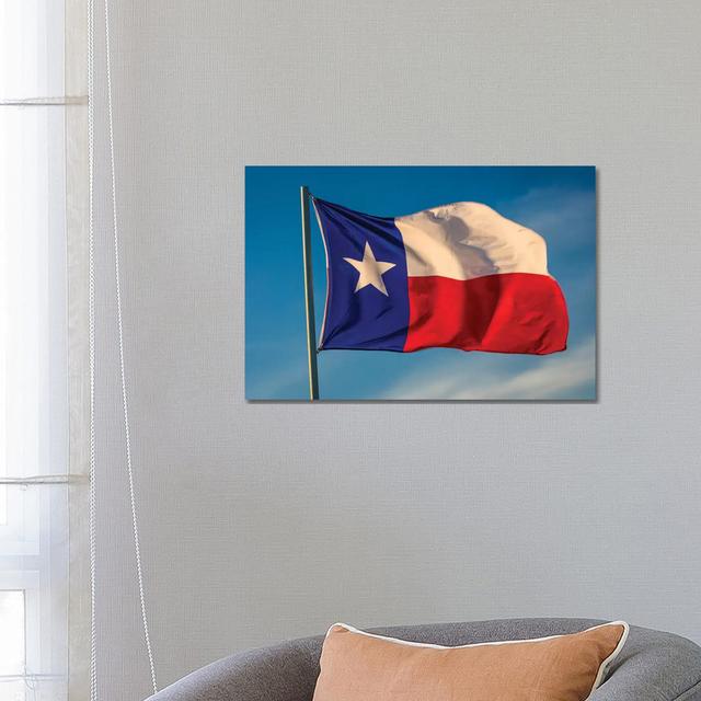 Texas "Lone Star" Flag Stands Out Against A Cloudless Blue Sky, Houston, Texas by Panoramic Images - Wrapped Canvas Gallery-Wrapped Canvas Giclée Lati on Productcaster.