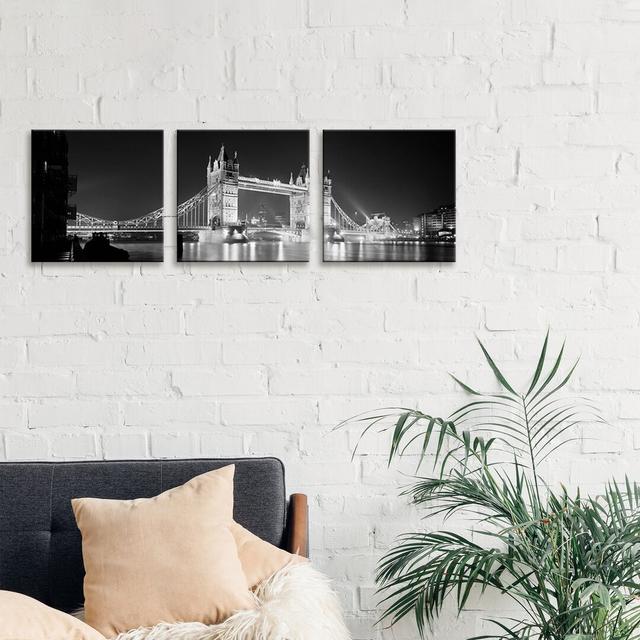 Low Angle View Of A Bridge Lit Up At Night, Tower Bridge, London, England (Black & White) - 3 Piece No Frame Panoramic Print on Canvas Latitude Run Si on Productcaster.