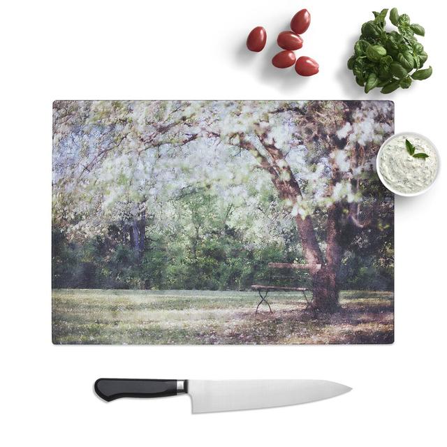 Blossom Tree in a Park Painting Chopping Board East Urban Home Size: 0.4cm H x 20cm W x 29cm L on Productcaster.