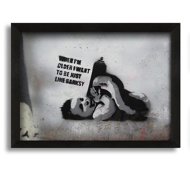 Be Like Banksy Ophelia & Co. Format: Black Framed Canvas, Size: 42cm H x 60cm W x 10cm D on Productcaster.