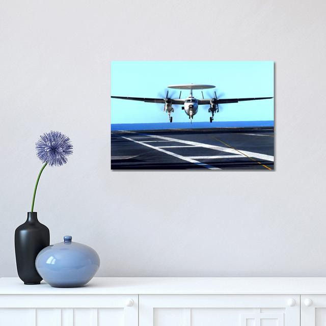 An E-2C Hawkeye Approaches For Landing Aboard USS John C. Stennis by Stocktrek Images - Wrapped Canvas Print Latitude Run Size: 30.48cm H x 45.72cm W on Productcaster.