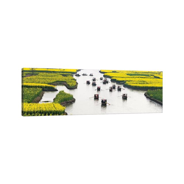 Rowing Boat On River Through Thousand-Islet Canola Flower Fields, Xinghua, Jiangsu Province, China by Keren Su - Wrapped Canvas Panoramic Print Brayde on Productcaster.