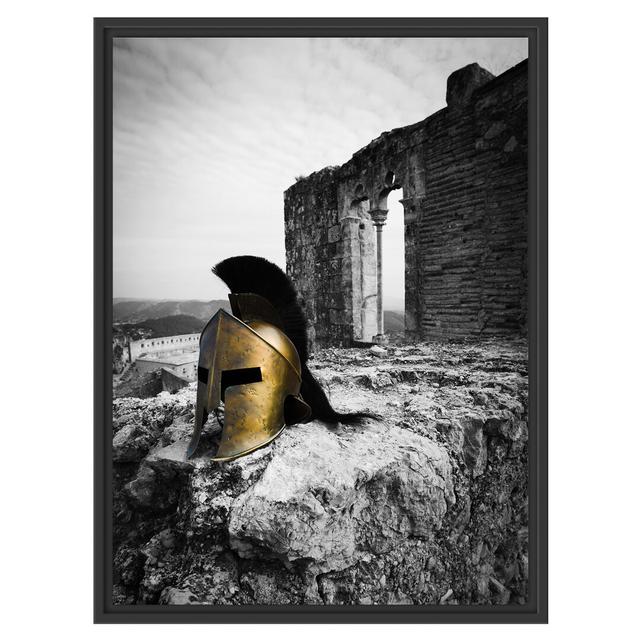 Gerahmtes Wandbild Helm einer Rüstung vor Ruine East Urban Home Größe: 80 cm H x 60 cm B on Productcaster.