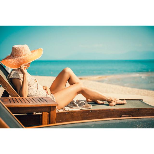 Woman In Beach Chair by VladGans - No Frame Art Prints on Canvas Beachcrest Home Size: 81cm H x 122cm W on Productcaster.