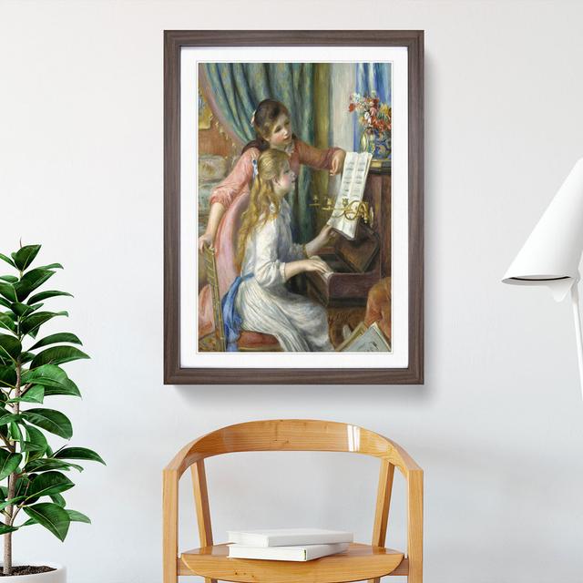 Two Young Girls at the Piano by Pierre-Auguste Renoir - Picture Frame Painting East Urban Home Frame Option: Walnut Framed, Size: 36cm H x 27cm W x 2c on Productcaster.