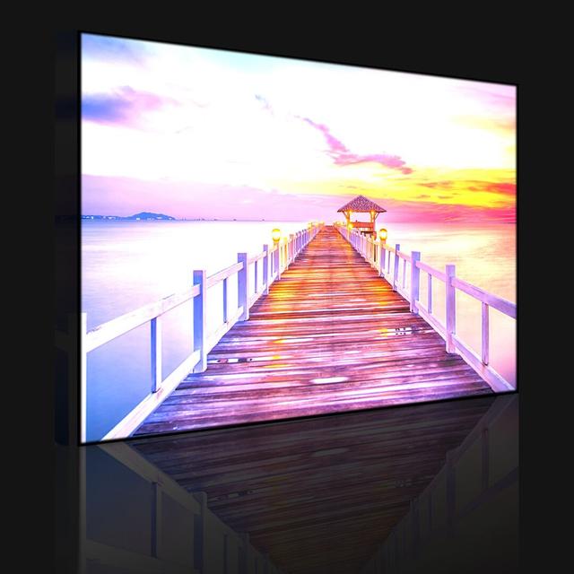 Jetty Into The Sea At Sunset - Wrapped Canvas Photograph Print lightbox-multicolor Size: 60cm H x 80cm W x 4.5cm D, Frame Option: Without lighting on Productcaster.