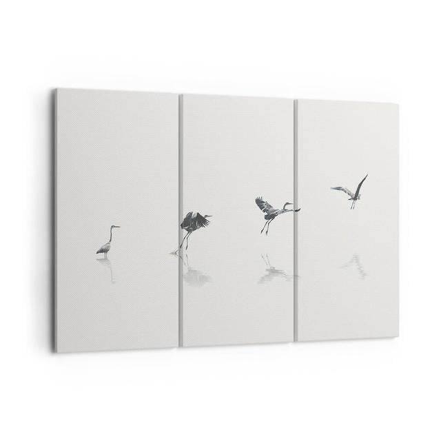 Gerahmtes Leinwandbild Flight Bird Heron Haus am Meer Größe: 70 cm H x 105 cm B on Productcaster.