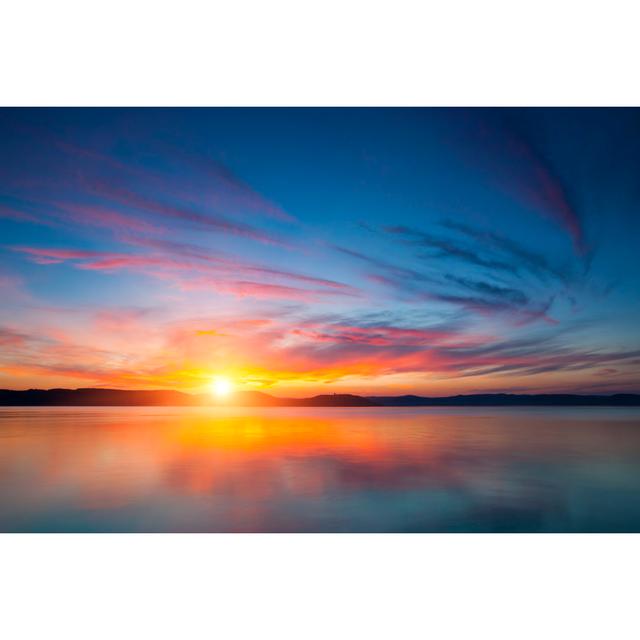 A Stunning View Of The Sunset Over Water by Focusstock - No Frame Art Prints on Canvas Beachcrest Home Size: 20cm H x 30cm W on Productcaster.