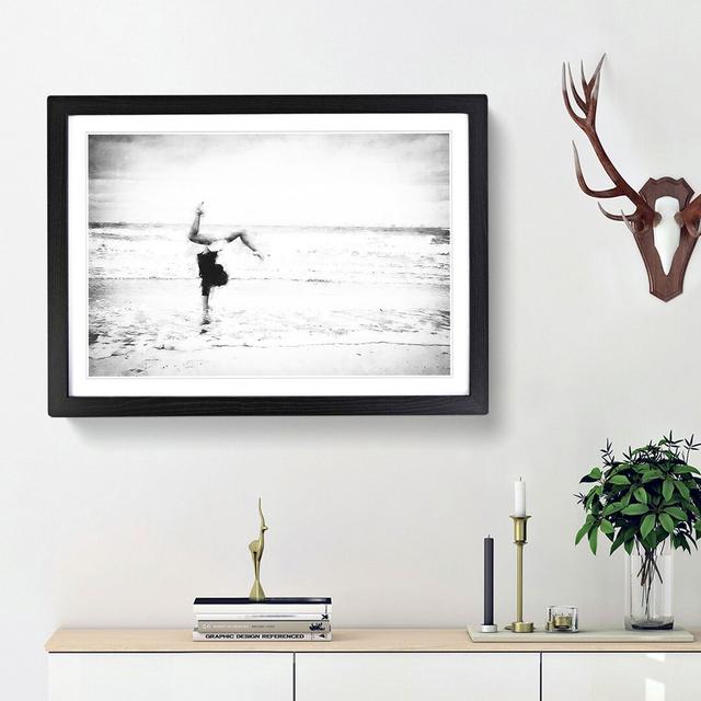 Gymnastics on the Beach - Picture Frame Painting Print East Urban Home Size: 62cm H x 87cm W x 2cm D, Frame Option: Black Framed on Productcaster.