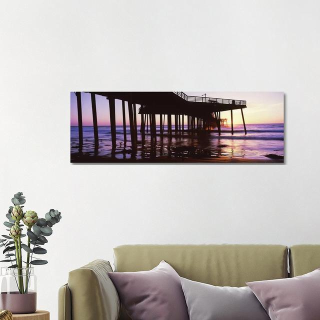 Silhouette Of Pismo Pier At Dusk, Pismo Beach, San Luis Obispo County, California, USA III by Panoramic Images - Wrapped Canvas Panoramic Photograph H on Productcaster.