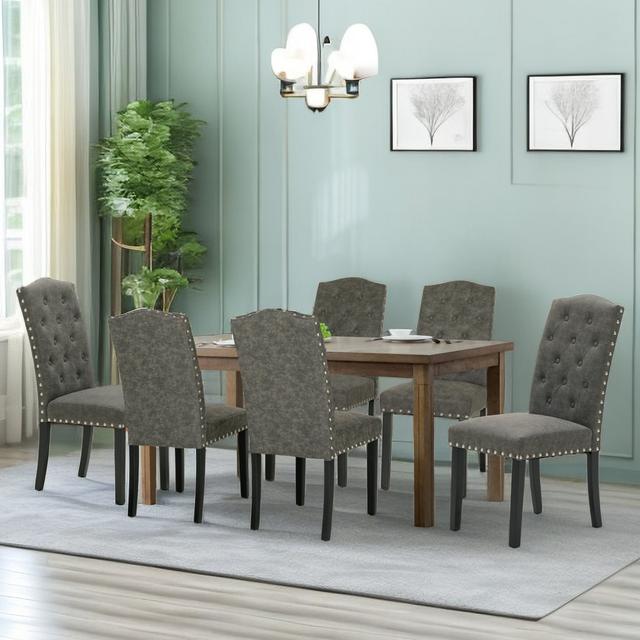 Upholstered Dining Chair Blue Elephant Upholstery Colour: Dark Grey, Leg Colour: Black on Productcaster.