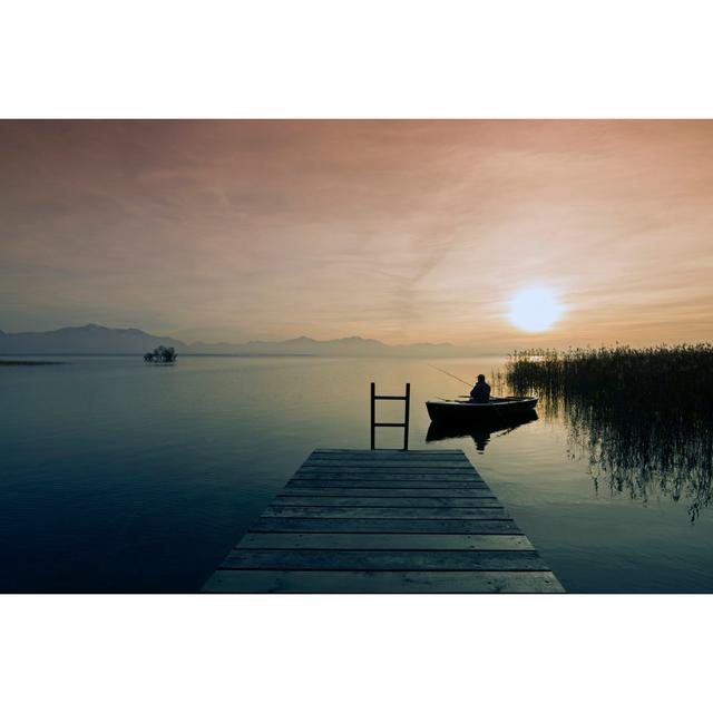 Fisher In Boat At Dusk by DieterMeyrl - No Frame Art Prints on Canvas Breakwater Bay Size: 61cm H x 91cm W on Productcaster.