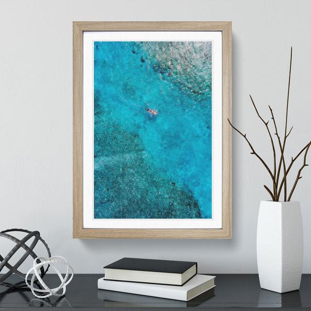 A Boat in the Maldives - Picture Frame Graphic Art East Urban Home Size: 48cm H x 36cm W x 2cm D, Frame Option: Oak Framed on Productcaster.